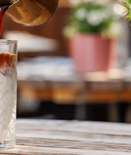 Crafted - Drinks - Bartender making a Iced Latte