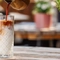 Crafted - Drinks - Bartender making a Iced Latte