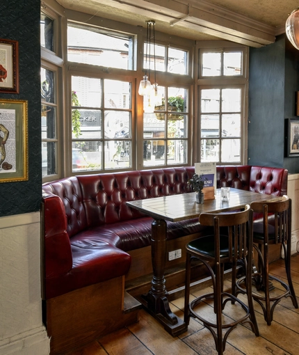 Internal seating area in a pub restaurant