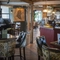 Interior image of the seating area and the bar