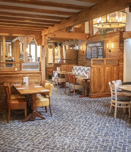 Interior dining area of a pub.