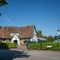 A view from across the road of the exterior facade, signage, and entrance of the Rudds Arms in Marton-In-Cleveland.