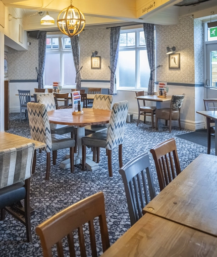 Interior dining area of a pub.