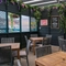 The exterior sheltered beer garden and seating area at the Tudor Arms.