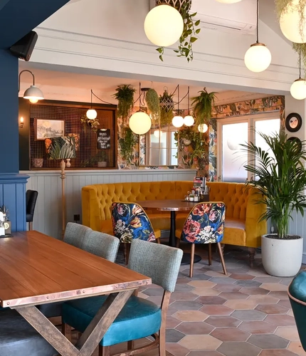 Some tables in the restaurant of the Boat House.