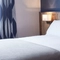 The interior of one of the hotel rooms featuring a double bed at The Churchill.