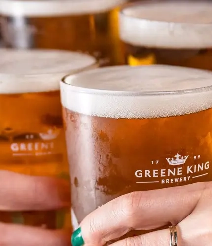 Pints of Greene King beers