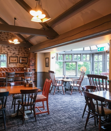 Interior dining area of a pub.