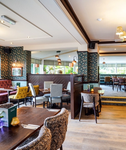 The interior restaurant seating area at The Two Greens.