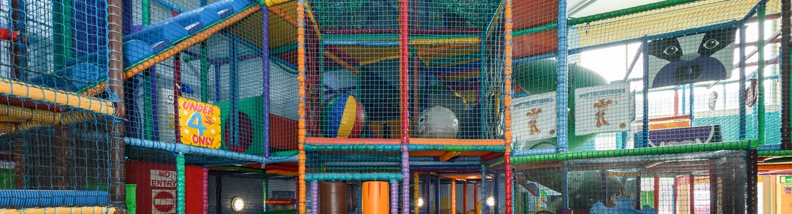 Interior play area of a pub with a dining area.