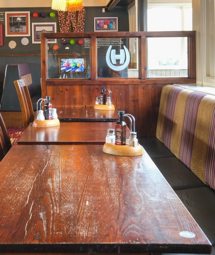 interior of the restaurant with a seating area