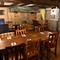 interior dining area of a pub with a fireplace