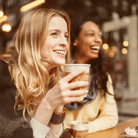 Two guests enjoying a cup of coffee together