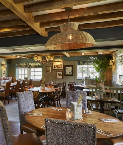 The interior restaurant seating area at The Fox & Hounds in Wimborne.