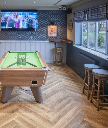 interior seating area with pool table