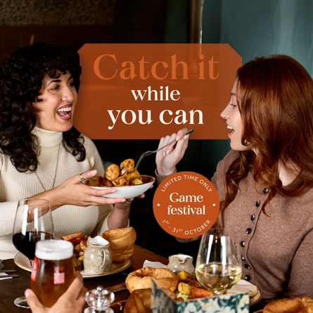 A banner focusing on 2 people sat at a table enjoying a selection of food & drinks with the wording "Catch It While You Can - Limited Time Only Game Festival 1st-31st October" at Chef & Brewer venues.