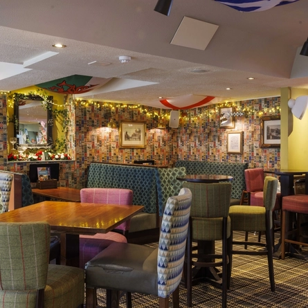 The interior restaurant and seating area with electronic pub games at The Northern Bar.