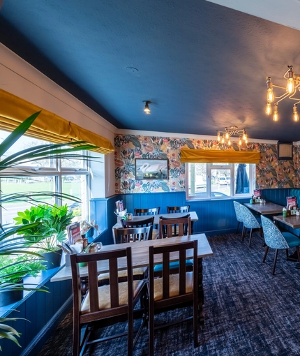 Interior seating area of the Cricketers in Southwick