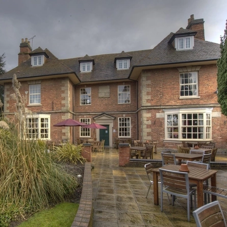 Rear outdoor seating area of a pub