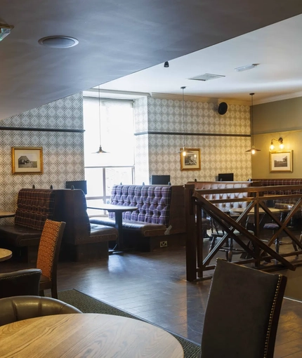Interior dining area of a pub.