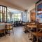 The interior restaurant seating area and conservatory with tables, chairs and wall mounted TV at The Castle View.