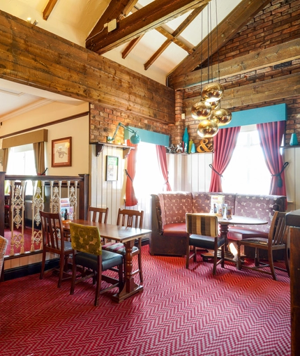 Interior dining area of a pub.