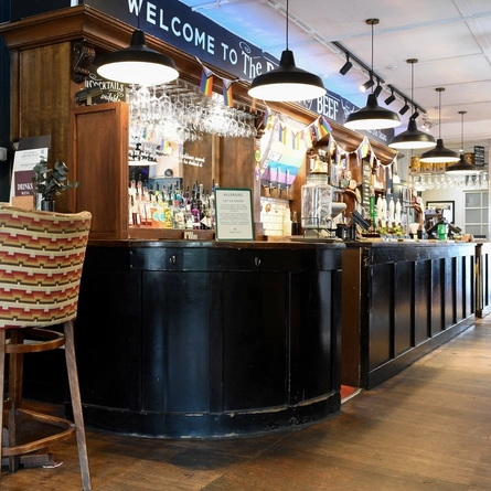The interior bar and restaurant seating area at The Baron Of Beef.