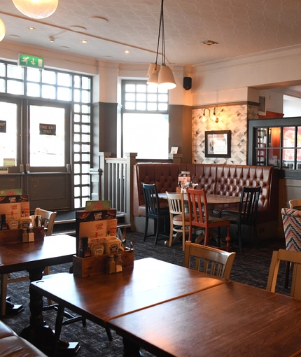 Interior dining area of a pub.