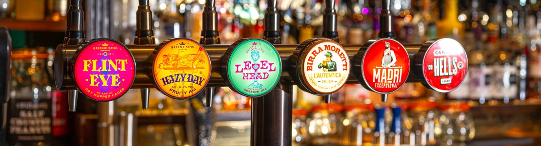 The interior bar area focusing on a selection of pump clips at the Two Brewers.