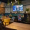The interior restaurant and seating area with TV at the Ship and Royal.
