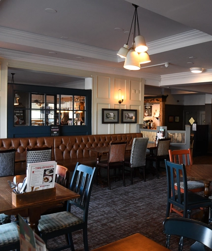 Interior dining area of a pub.