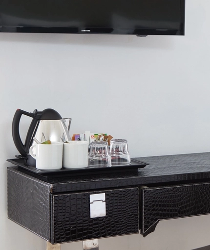 The interior of one of the hotel rooms with TV at The Chequers.