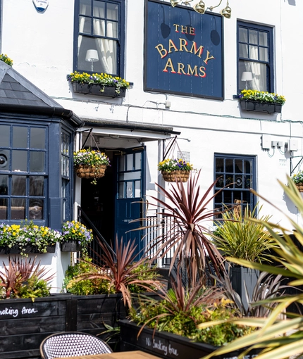 Exterior of the pub with plants outside