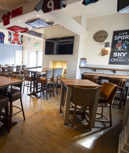 interior restaurant and seating area with pub games