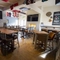 interior restaurant and seating area with pub games