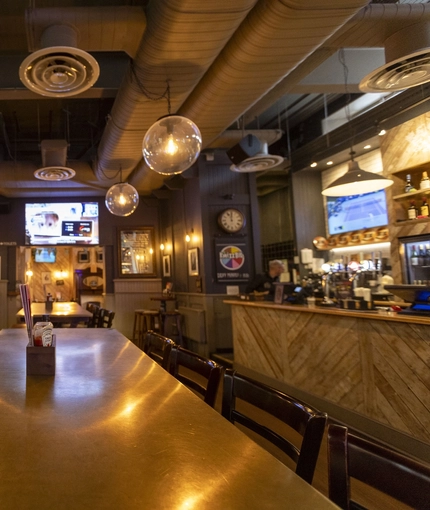 interior restaurant and seating area with bar