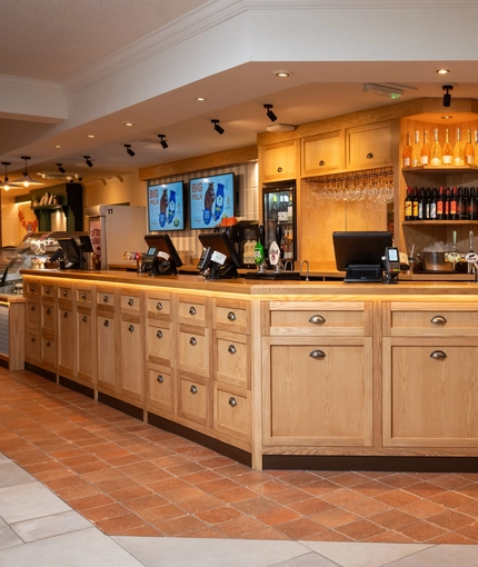 The interior bar area with tiled flooring at The Farmhouse Kitchen Willington.