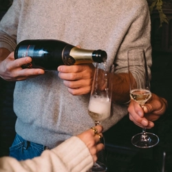 Pouring a glass of champagne