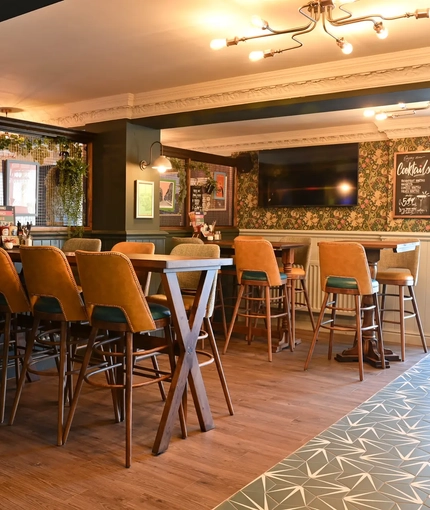 Some tables in the restaurant of the Boat House.