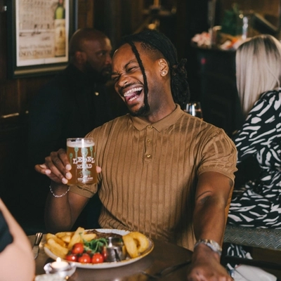 Couples enjoying a valentines meal at a Greene King Heritage vanue.