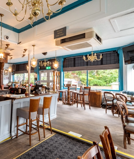 Seating area and bar area in a pub