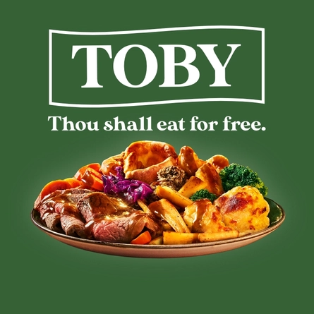 A banner showing the words "Toby" and "Thou shall eat for free", above a plate of roast dinner.