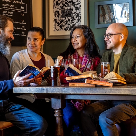 A group of people seated at a table.