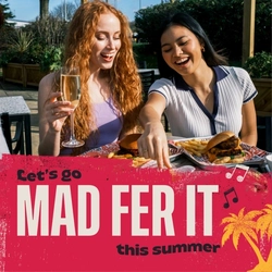 A banner promoting 'a summer to be shared' at Flaming Grill venues.