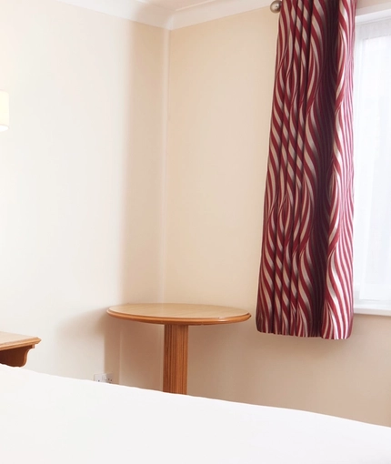 The interior of one of the hotel rooms at The Farmhouse.