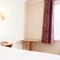 The interior of one of the hotel rooms at The Farmhouse.