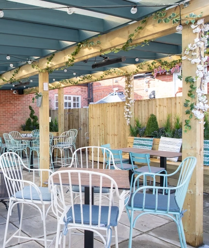 exterior beer garden with seating area