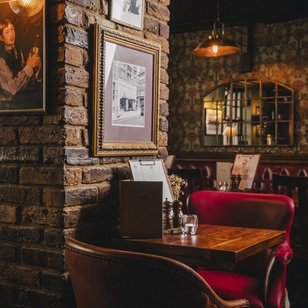 The interior restaurant and seating area at the Three Tuns.