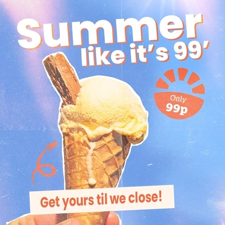 Ice cream served in a cone with a chocolate flake.