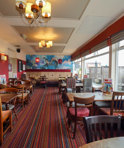 Interior dining area of a pub.